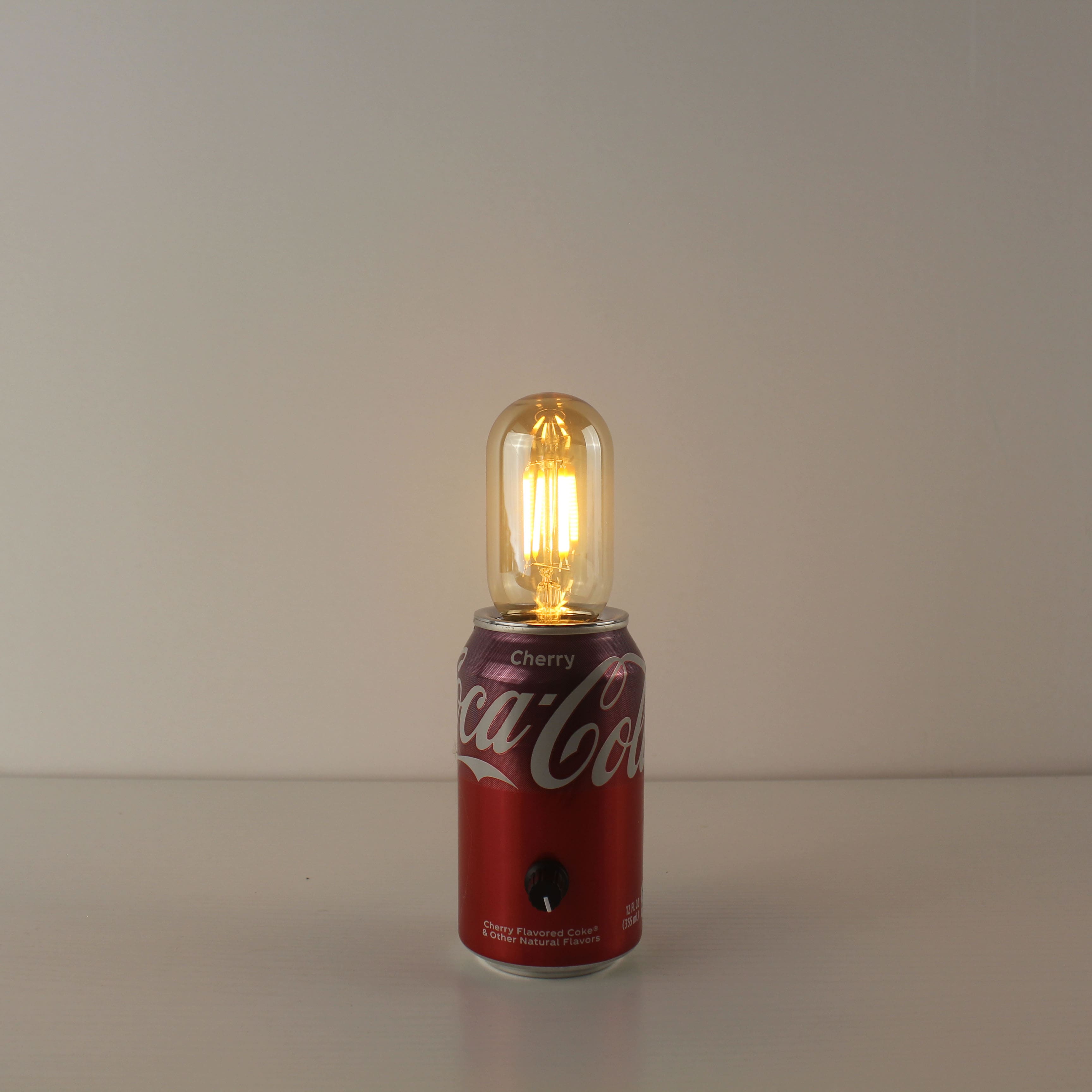upcycled coca cola can battery bar table lamp