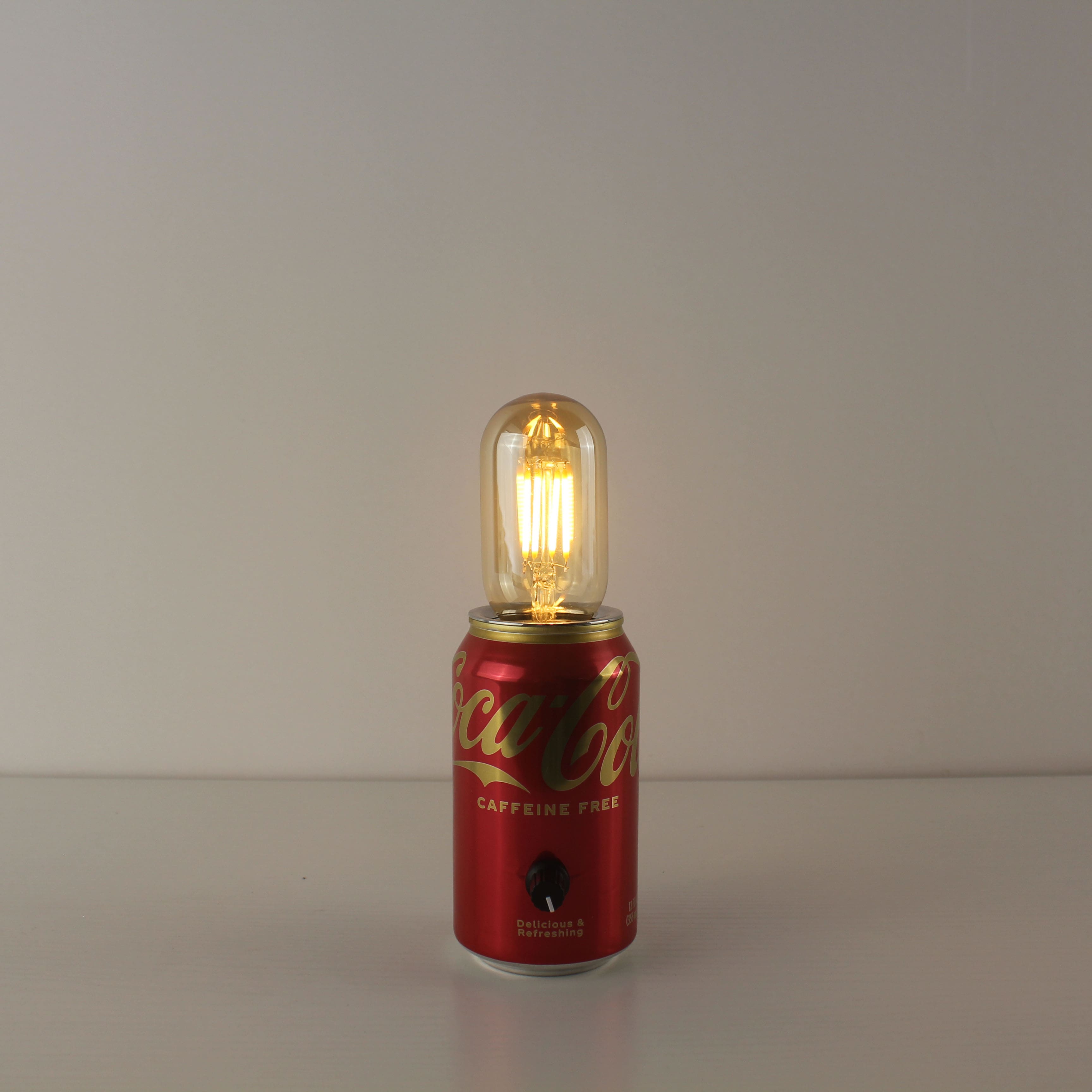 upcycled coca cola can battery run table wedding lamps