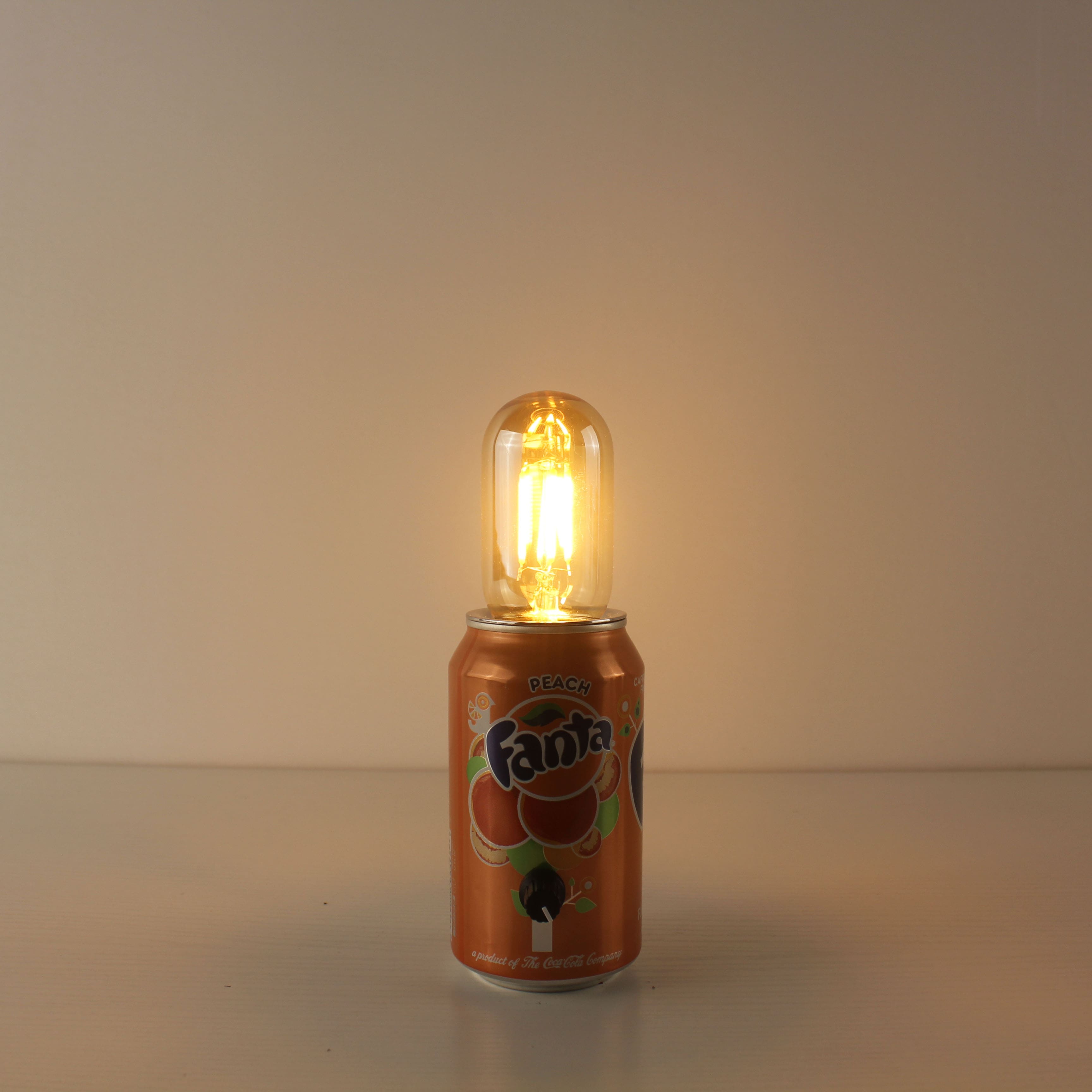 upcycled fanta soda pop can recharge eco-friendly table lamp